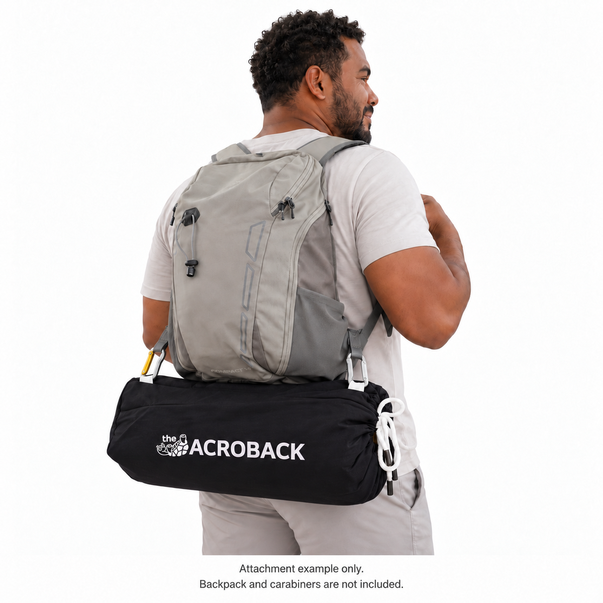 AcroBack Travel Bag attached below a backpack using its white loops. Attachment example only; backpack and carabiners are not included.
